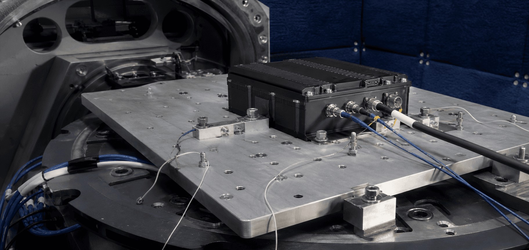 Conceptual rugged computing module mounted in an environmental qualification test fixture.